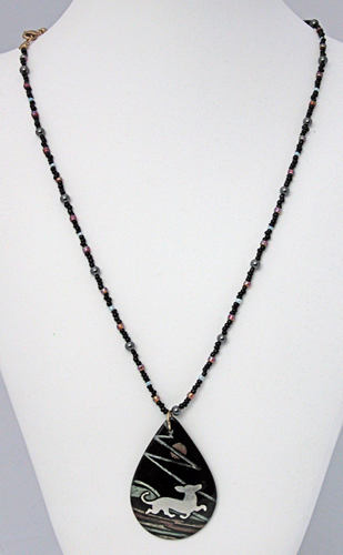 Hand painted china pendant with 99.9% silver dachshund